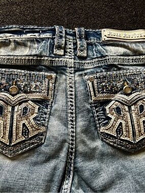 Rock Revival Distressed Light Blue Jeans with Embellished Back Pockets NWOT